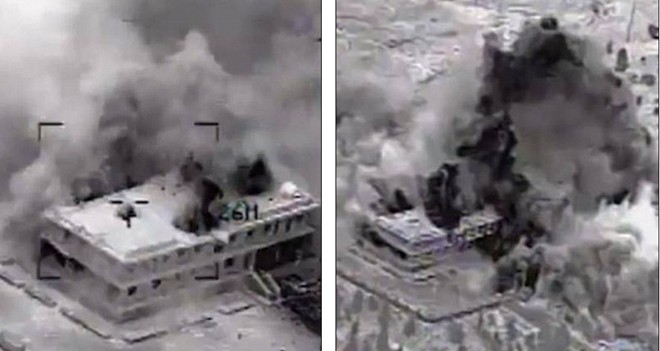 Khói và bụi bốc lên từ khu nhà chứa phương tiện của IS ở Abu Kamel. Mỹ sử dụng vũ khí được vệ tinh dẫn đường để phá hủy công trình này. Ảnh: Lầu Năm Góc