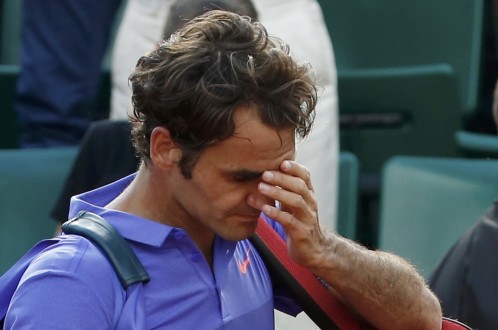 Nỗi buồn thua trận của Federer. Ảnh: Reuters
