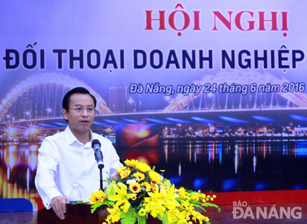 Ủy viên Trung ương Đảng, Bí thư Thành ủy, Chủ tịch HĐND thành phố Nguyễn Xuân Anh phát biểu tại buổi đối thoại. 									             Ảnh: XUÂN DUYÊN