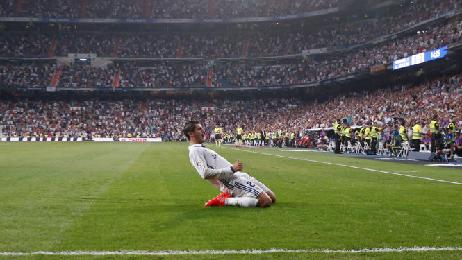 Niềm vui của Morata sau khi mở tỉ số cho Real. Ảnh: Reuters