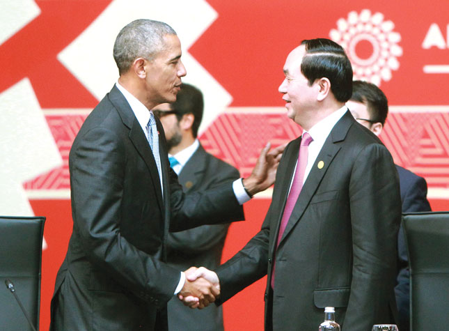 Chủ tịch nước Trần Đại Quang và Tổng thống Mỹ Barack Obama tại Hội nghị cấp cao APEC lần thứ 24 ở Peru.  Ảnh: Reuters