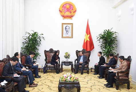 Thủ tướng Nguyễn Xuân Phúc tiếp bà Tôn A Phương, Chủ tịch Tập đoàn Huawei, Trung Quốc. Ảnh: VGP/Quang Hiếu