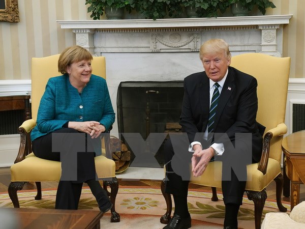 Tổng thống Mỹ Donald Trump và Thủ tướng Đức Angela Merkel. (Ảnh: EPA/TTXVN)