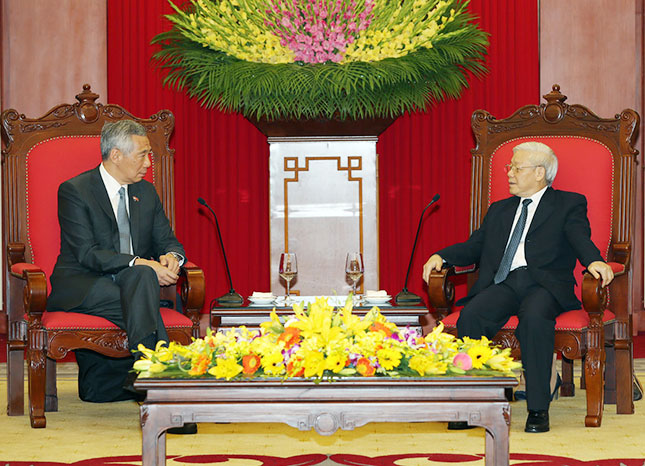 Tổng Bí thư Nguyễn Phú Trọng tiếp Thủ tướng Singapore Lý Hiển Long thăm chính thức Việt Nam.  					                    Ảnh: TTXVN