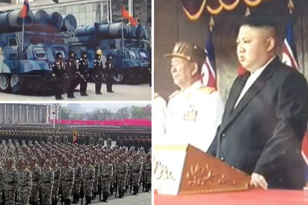 Nhà lãnh đạo Kim Jong-un theo dõi cuộc duyệt binh từ khán đài