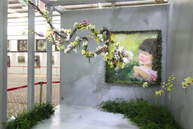 Nguyễn Phi Minh’s floral artwork ‘Oracle of Love’ at the Sanya International Orchid Festival 2016 in China. — Photo courtesy of Nguyễn Phi Minh Read more at http://vietnamnews.vn/sunday/features/376206/an-engineer-turned-florist-and-his-passion-for-floral-art.html#tcZTAA6xpSr08Q1I.99