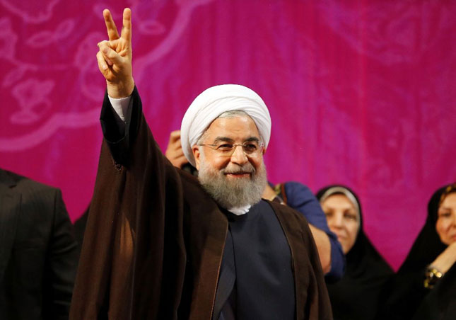 Với những chính sách ngoại giao ôn hòa, Tổng thống Hassan Rouhani đã mở cánh cửa của Iran ra thế giới.                       Ảnh: AFP