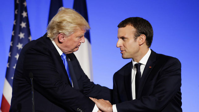 Vấn đề chống biến đổi khí hậu được hai nhà lãnh đạo Mỹ và Pháp đề cập trong cuộc gặp gỡ tại Paris. 	Ảnh: AP
