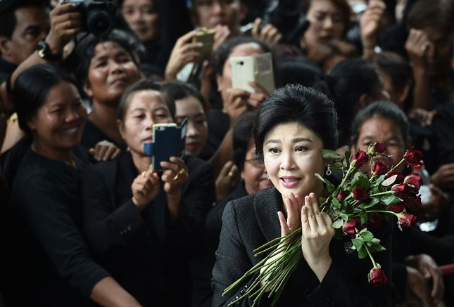 Cựu Thủ tướng Yingluck Shinawatra vẫn được nhiều người dân Thái ủng hộ. 		          Ảnh: AFP