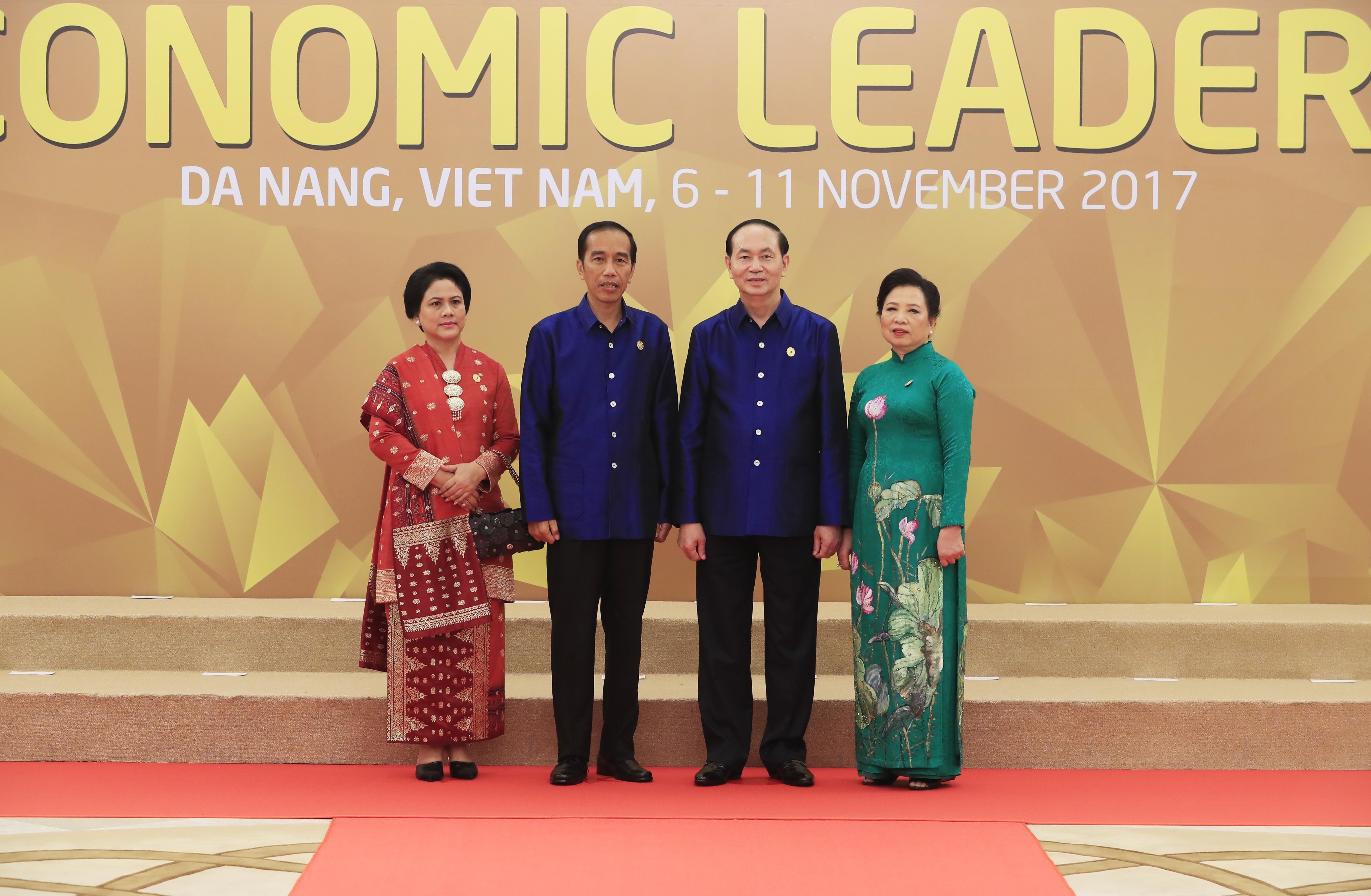  …Indonesian President Joko Widodo and his wife,…