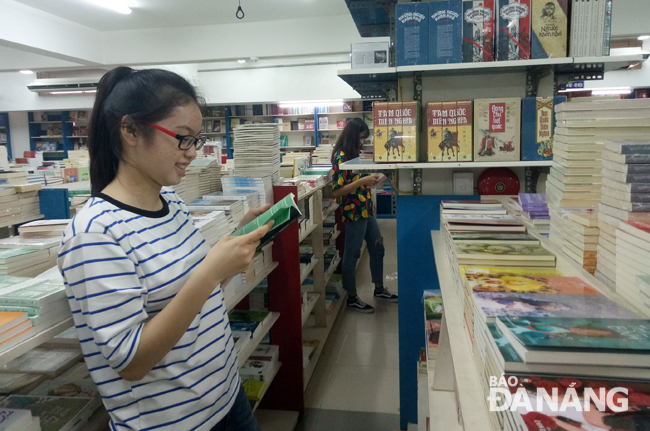  Youth interested in reading books in a local book shop
