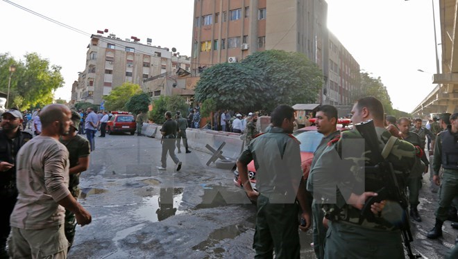 Hiện trường một vụ đánh bom liều chết ở Damascus, Syria. (Nguồn: AFP/TTXVN)