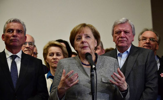 Thủ tướng Angela Merkel cam kết đưa nước Đức vượt qua khủng hoảng.Ảnh: AFP