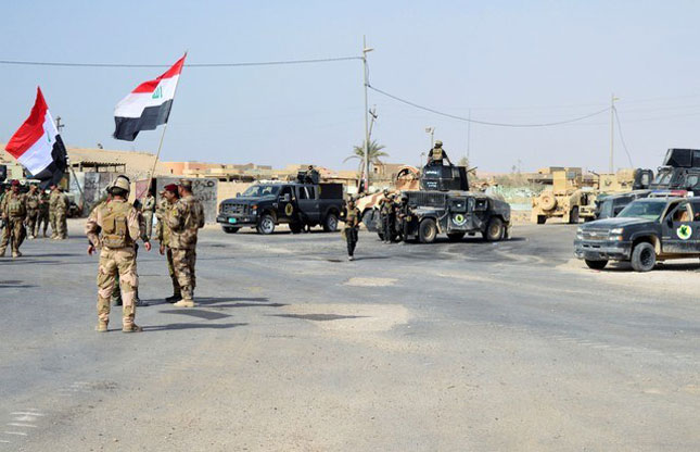 Lực lượng Iraq giành lại quyền kiểm soát thị trấn Rawa, thành trì cuối cùng của IS tại quốc gia này. 	Ảnh: Reuters 