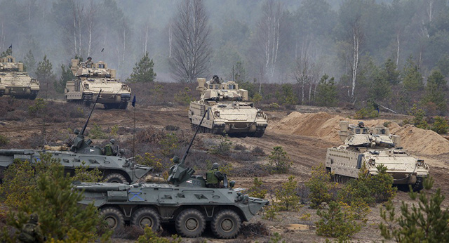 Binh sĩ NATO diễn tập quân sự ở Lithuania năm 2014. (Ảnh: AP)