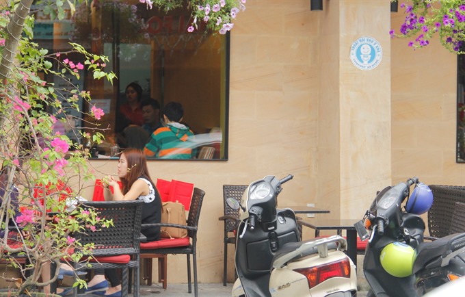 A cafe offer a free restroom for tourists and local people. — VNS Photo Công Thàn Read more at http://vietnamnews.vn/society/417965/da-nang-cafes-restaurants-offer-free-restrooms-for-tourists.html#RVVglZUomEyytwH7.99
