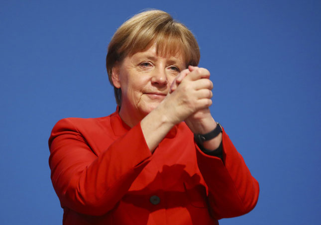 Thủ tướng Angela Merkel kỳ vọng đảng Dân chủ Xã hội (SPD) đồng ý liên minh với đảng của bà.  Ảnh: Reuters