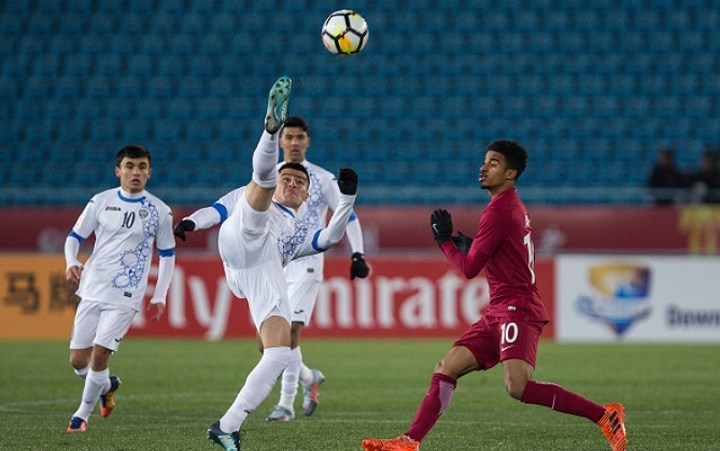 2. U23 Uzbekistan (áo trắng) nhì bảng A với 6 điểm.