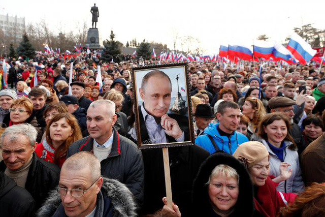 Tổng thống đương nhiệm Putin được dự đoán sẽ chiến thắng áp đảo trong cuộc bầu cử. (Ảnh: Reuters)