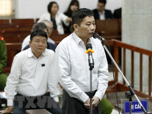 Bị cáo Ninh Văn Quỳnh trả lời các câu hỏi của Hội đồng xét xử. (Ảnh: Văn Điệp/TTXVN)