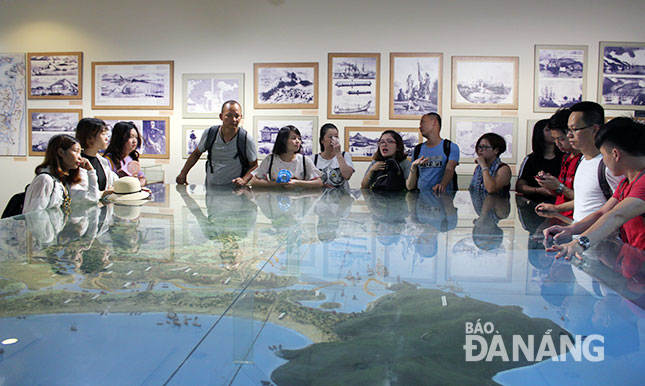 Visitors learning about the city’s history and culture through trips to the Museum of Da Nang 