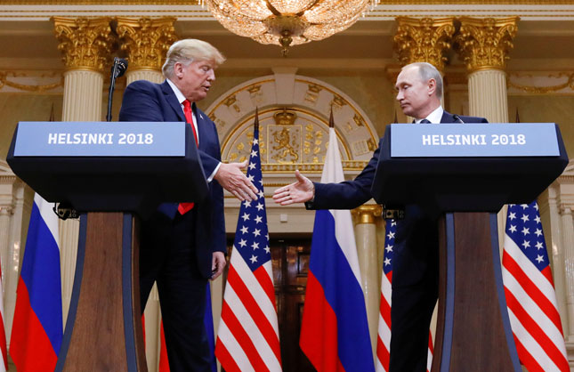 Cuộc gặp gỡ giữa Tổng thống Mỹ Donald Trump (trái) và Tổng thống Nga Vladimir Putin tại Helsinki ngày 16-7 thu hút sự chú ý của cả thế giới.  Ảnh: Reuters