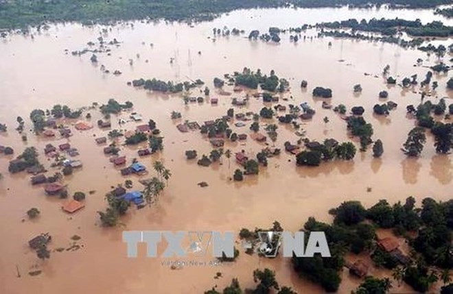 The Sepien-Senamnoi hydropower dam collapsed on July 23, causing massive floods which completely isolated six villages in the Sanamxay district of Attapeu province (Source: EPA/VNA)