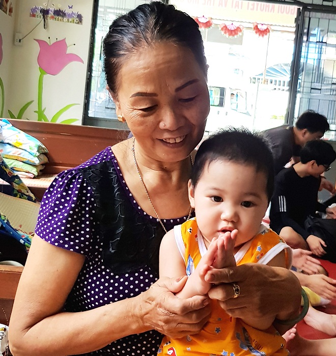 For Mrs Guong, taking care of orphan kids and reliving the days of her motherhood are the happiest things in her life