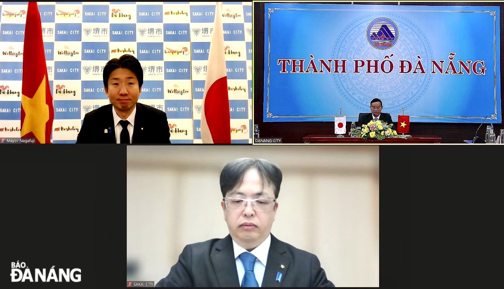 Chairman of the Da Nang People's Committee Le Trung Chinh (right) and Mayor of Sakai (Japan) Nagafuji Hideki (left) co-chair the online meeting. Photo: T.PHUONG