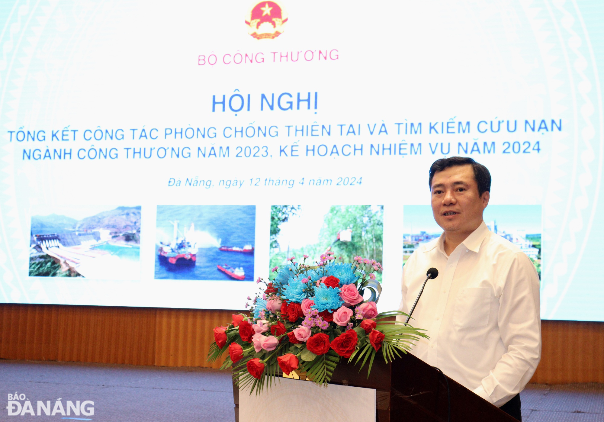 Deputy Minister of Industry and Trade Nguyen Sinh Nhat Tan speaking at the conference. Photo: HOANG HIEP