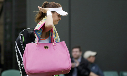 Radwanska trở thành ứng viên mới nhất rời cuộc chơi ở Wimbledon. Ảnh: Reuters.