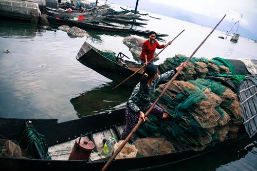   Local residents earning their living in the inlet