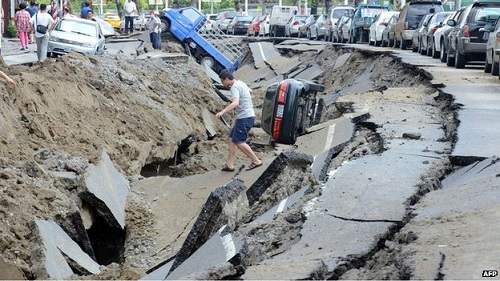 The explosions split roads in two and threw vehicles into the air