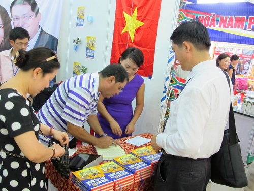 Fair visitors at a book stand