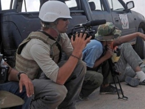 Nhà báo James Foley trong lúc tác nghiệp ở Syria - Ảnh: Reuters 