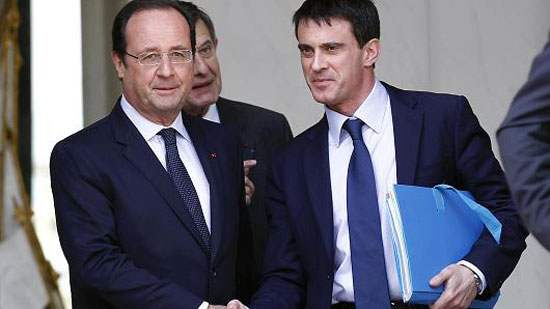 Tổng thống Francois Hollande (trái) ra lệnh Thủ tướng Manuel Valls (phải) thành lập nội các mới trong hôm nay (26-8).     Ảnh: Getty Images