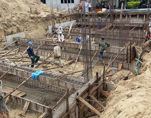 Workers at a construction site of the Nhiet Doi Company's project