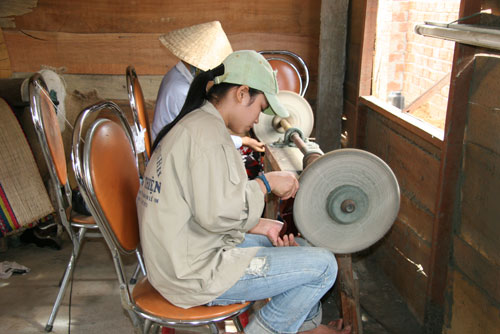 Making handicrafts at a local small-sized enterprise