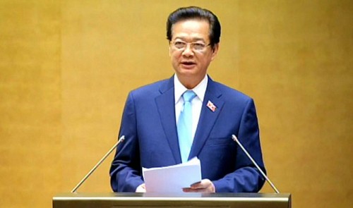 Prime Minister Nguyen Tan Dung presents a report on social and economic performance during 2014 and the new tasks set for 2015 at the 8th session of the 13th National Assembly that opens in Ha Noi on October 20, 2014.