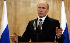   AFP / Vasily Maximov   Russian President Vladimir Putin speaks during a press conference on October 17, 2014 in Milan, Italy