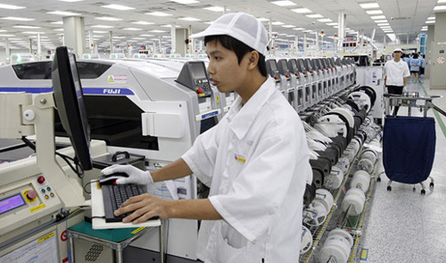 An employee is seen working at a Samsung plant in Bac Ninh Province, Viet Nam.