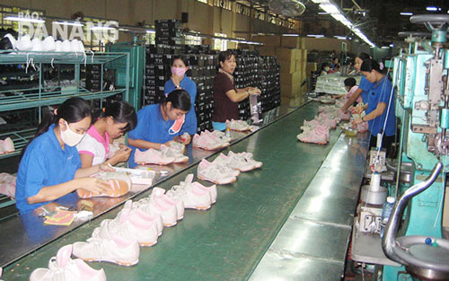  Making shoes at a local enterprise