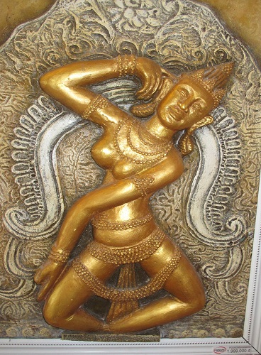 A locally-made magnetic postcard depicting the image of an apsara dancer