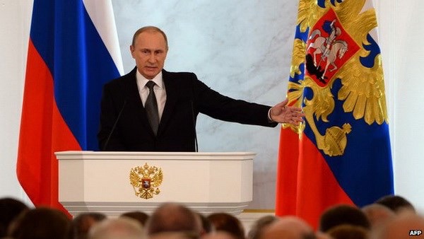 Tổng thống Vladimir Putin đọc thông điệp liên bang, để cao nội lực của nước Nga. (Nguồn: AFP)