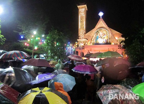 Catholic worshippers gathered at the Thanh Duc Parish Church in the rain …