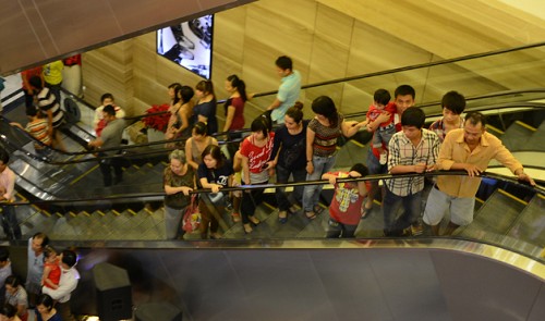 Shoppers are seen at a Vincom shopping mall in Ho Chi Minh City.