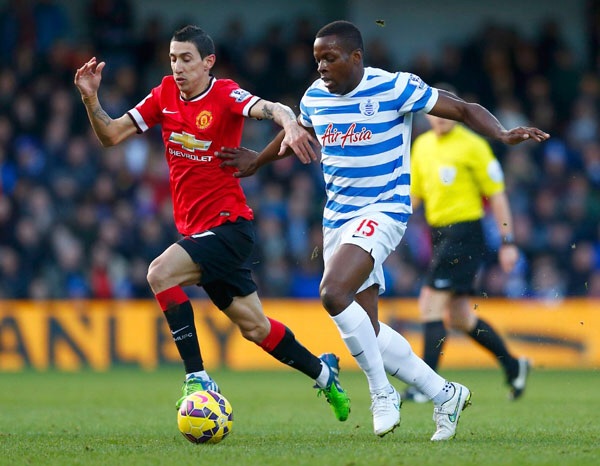 Di Maria thường xuyên bị đeo bám bởi những cầu thủ giàu sức mạnh của QPR. Ảnh: Reuters.