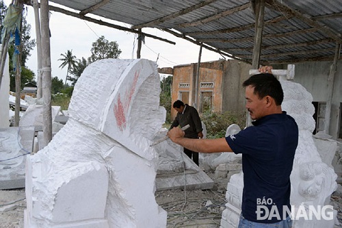 A stone sculpture being carved in Ngu Hanh Son District