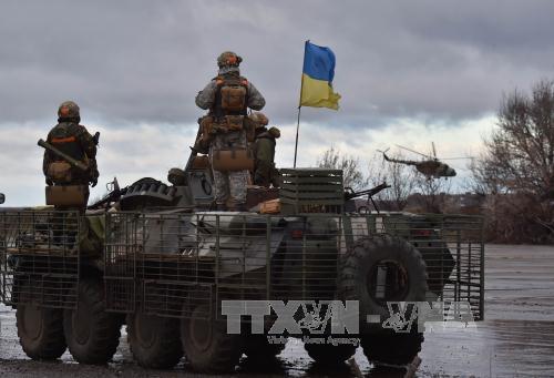 Binh sĩ quân đội Ukraine tuần tra tại thành phố Kramatorsk, vùng Donetsk, miền đông Ukraine. Ảnh: AFP-TTXVN.