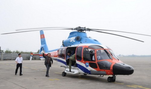 An EC 155 B1 French helicopter carried passengers around Da Nang City in central Vietnam on February 10, 2015. Tuoi Tre